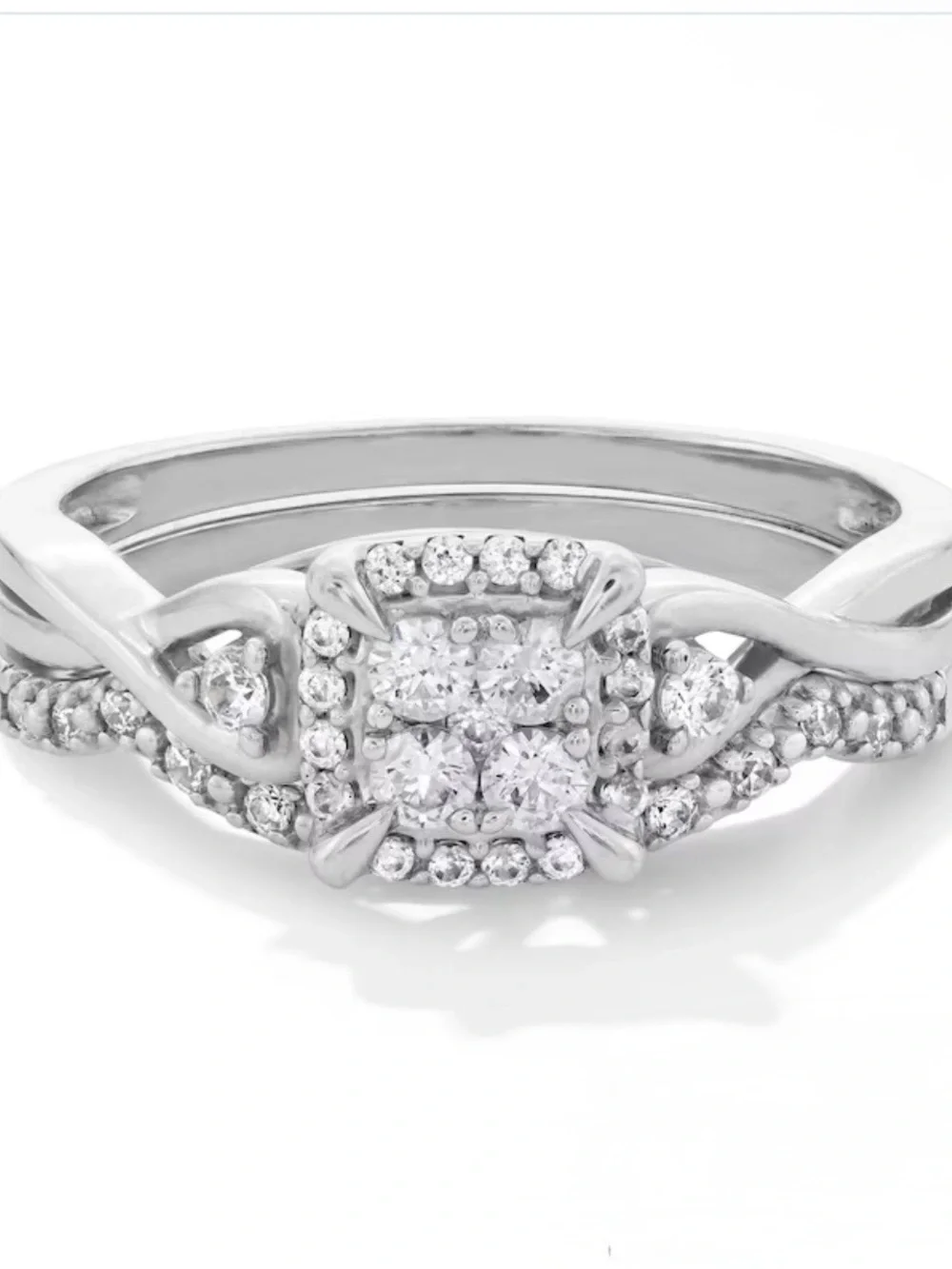 1/3 CT. T.W. Multi-Diamond Twist Shank Bridal Set in 10K White Gold  SIZE:7